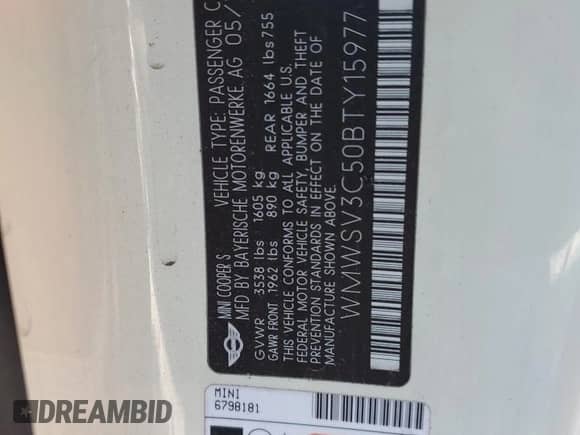 2011 MINI Hardtop S with VIN WMWSV3C50BTY15977, listed as a Copart auction lot 52802295 with 89,085 mi miles and Salvage title. Bid and sale history available at DreamBid. Image 13.
