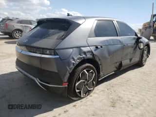 2022 Hyundai Ioniq 5 SEL с VIN KM8KN4AE7NU081229, выставлен на аукционе Copart как лот 64097852 с пробегом 6 347 миль миль и . История ставок и продаж доступна на DreamBid. Изображение 4.
