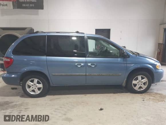 2007 Dodge Caravan SXT with VIN 1D4GP45R87B129081, listed as a IAAI auction lot 42798178 with 209,067 mi miles and . Bid and sale history available at DreamBid. Image 13.