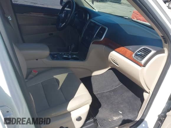 2013 Jeep Grand Cherokee Limited z VIN 1C4RJFBG8DC556272, wystawiony jako IAAI lot #43352592 z przebiegiem 118 793 mil mil oraz . Historia ofert i sprzedaży dostępna na DreamBid. Obrazek 5.