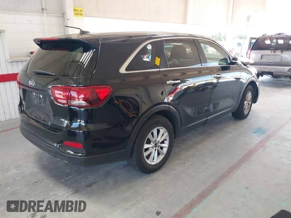 2020 Kia Sorento LX with VIN 5XYPG4A52LG671390, listed as a IAAI auction lot 42922230 with 149,957 mi miles and . Bid and sale history available at DreamBid. Image 4.
