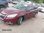 2015 Chevrolet Malibu LT z VIN 1G11D5SLXFF126832, wystawiony jako IAAI lot #43291645 z przebiegiem 172 901 mil mil oraz . Historia ofert i sprzedaży dostępna na DreamBid. Obrazek 2.