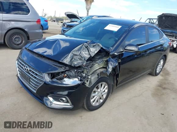 2022 Hyundai Accent SE z VIN 3KPC24A65NE166028, wystawiony jako IAAI lot #43289568 z przebiegiem 61 170 mil mil oraz . Historia ofert i sprzedaży dostępna na DreamBid. Obrazek 17.