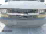 2002 Chevrolet Astro Cargo z VIN 1GCDM19X72B147077, wystawiony jako IAAI lot #42332534 z przebiegiem 207 954 mil mil oraz . Historia ofert i sprzedaży dostępna na DreamBid. Obrazek 6.