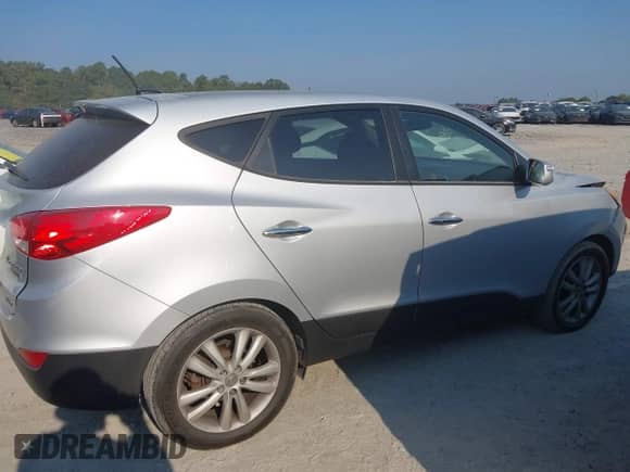 2013 Hyundai Tucson GLS with VIN KM8JUCAC4DU729468, listed as a IAAI auction lot 43157791 with 155,911 mi miles and . Bid and sale history available at DreamBid. Image 13.