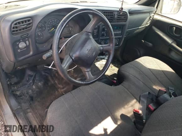 1999 Chevrolet S-10 с VIN 1GCCS14X2X8173521, выставлен на аукционе Copart как лот 68181484 с пробегом 100 104 миль миль и Списание • Salvage title. История ставок и продаж доступна на DreamBid. Изображение 8.