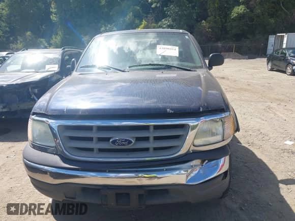 2003 Ford F-150 XL z VIN 1FTRF18263NA54847, wystawiony jako IAAI lot #43050454 z przebiegiem Nie podano mil oraz . Historia ofert i sprzedaży dostępna na DreamBid. Obrazek 12.