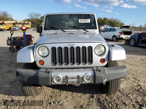 2010 Jeep Wrangler Sahara z VIN 1J4AA5D10AL108467, wystawiony jako Copart lot #89720615 z przebiegiem 158 003 mil mil oraz Czysty tytuł • Clean title. Historia ofert i sprzedaży dostępna na DreamBid. Obrazek 5.
