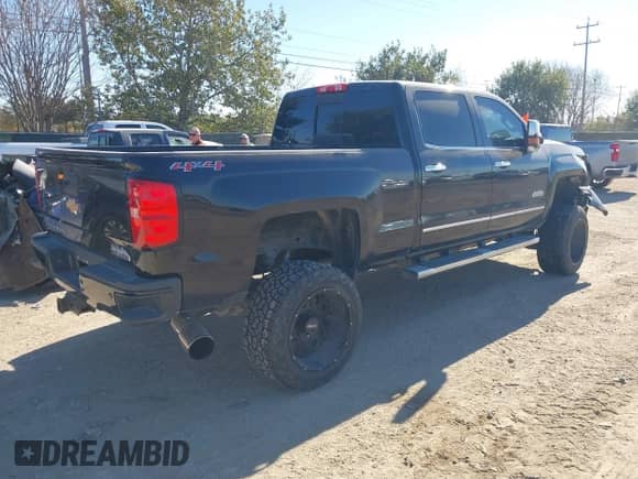 2016 Chevrolet Silverado 2500HD High Country z VIN 1GC1KXE89GF283916, wystawiony jako IAAI lot #41202088 z przebiegiem 182 756 mil mil oraz . Historia ofert i sprzedaży dostępna na DreamBid. Obrazek 4.
