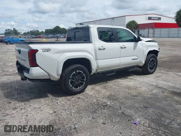 2025 Toyota Tacoma SR5 with VIN 3TMKB5FN2SM028806, listed as a IAAI auction lot 43258727 with 10,320 mi miles and . Bid and sale history available at DreamBid. Image 4.