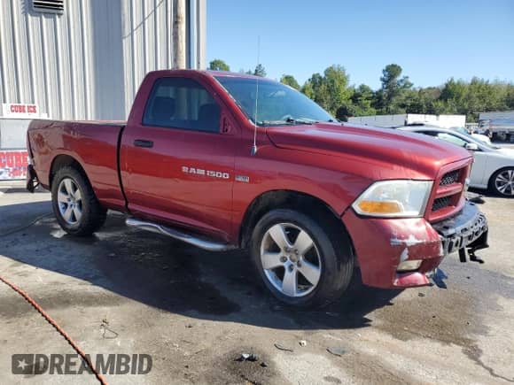 2012 Ram 1500 Tradesman z VIN 3C6JD6AT1CG156723, wystawiony jako Copart lot #89538865 z przebiegiem 62 156 mil mil oraz Czysty tytuł • Clean title. Historia ofert i sprzedaży dostępna na DreamBid. Obrazek 4.