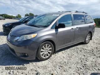 2012 Toyota Sienna XLE with VIN 5TDDK3DC0CS047130, listed as a Copart auction lot 70273485 with 128,016 mi miles and Clean title. Bid and sale history available at DreamBid. Image 1.