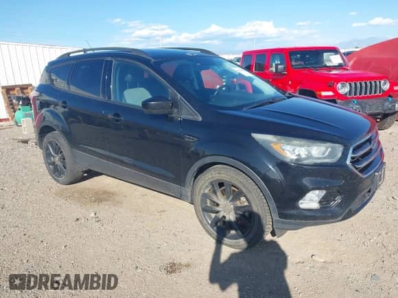 2017 Ford Escape SE z VIN 1FMCU9G92HUD59019, wystawiony jako IAAI lot #43229696 z przebiegiem 110 838 mil mil oraz . Historia ofert i sprzedaży dostępna na DreamBid. Obrazek 1.
