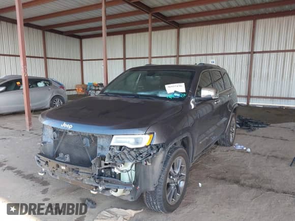 2018 Jeep Grand Cherokee Overland with VIN 1C4RJFCG3JC268170, listed as a IAAI auction lot 41957196 with 94,811 mi miles and . Bid and sale history available at DreamBid. Image 2.