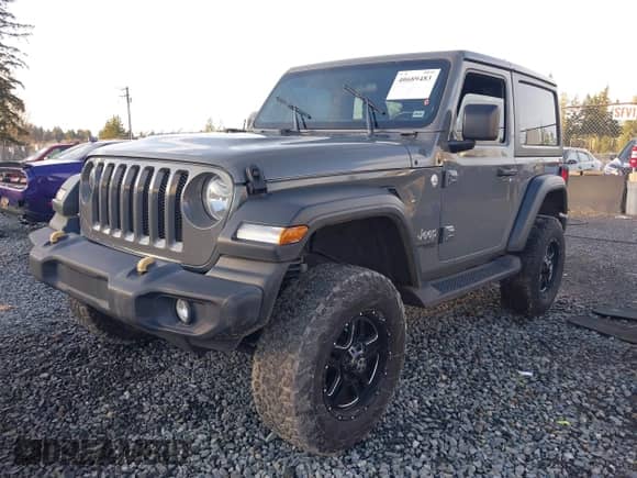 2019 Jeep Wrangler Sport S with VIN 1C4GJXAG3KW518815, listed as a IAAI auction lot 40689483 with 97,268 mi miles and . Bid and sale history available at DreamBid. Image 2.