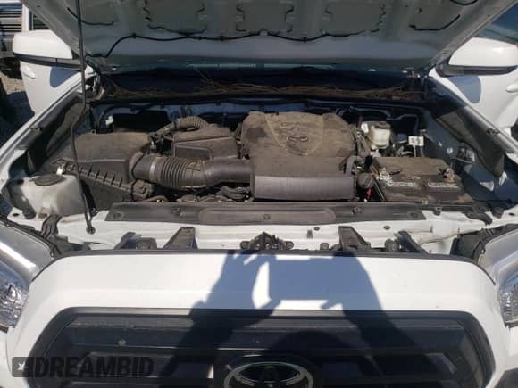 2021 Toyota Tacoma SR z VIN 5TFCZ5AN7MX267045, wystawiony jako Copart lot #65592105 z przebiegiem 40 992 mil mil oraz Szkoda całkowita • Salvage title. Historia ofert i sprzedaży dostępna na DreamBid. Obrazek 11.