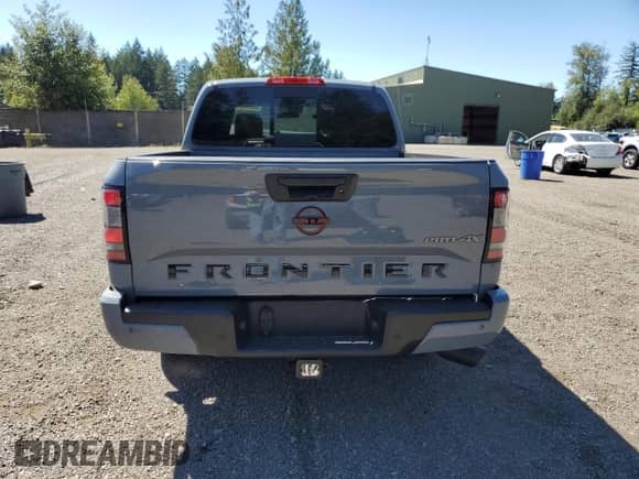 2023 Nissan Frontier Pro-4X with VIN 1N6ED1EK8PN624990, listed as a Copart auction lot 66409585 with 41,232 mi miles and Salvage title. Bid and sale history available at DreamBid. Image 6.