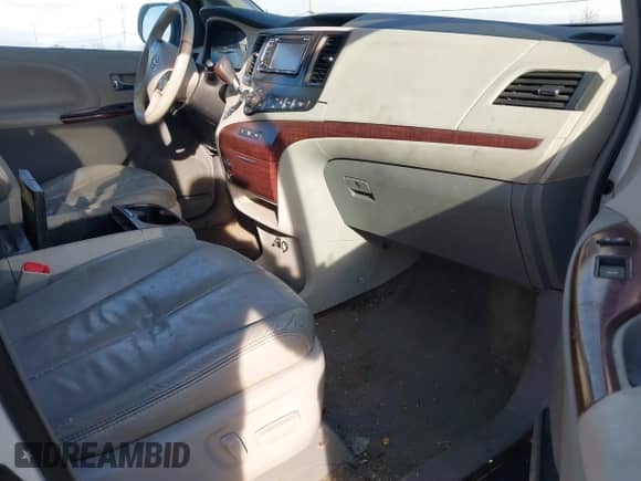 2013 Toyota Sienna XLE AAS with VIN 5TDYK3DC8DS324853, listed as a IAAI auction lot 41647704 with 143,656 mi miles and . Bid and sale history available at DreamBid. Image 5.