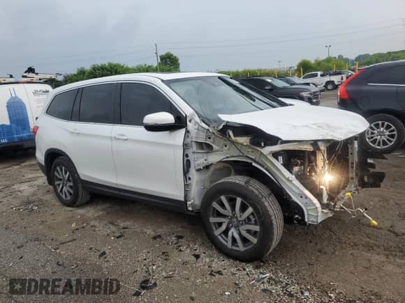 2022 Honda Pilot EX-L with VIN 5FNYF6H57NB033154, listed as a Copart auction lot 63794915 with 40,525 mi miles and Salvage title. Bid and sale history available at DreamBid. Image 4.