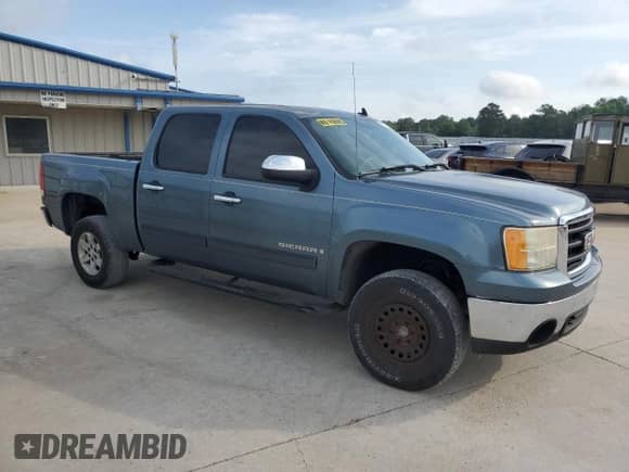 2007 GMC Sierra 1500 SLT with VIN 2GTEC13J671569831, listed as a Copart auction lot 54976755 with 240,511 mi miles and Salvage title. Bid and sale history available at DreamBid. Image 4.