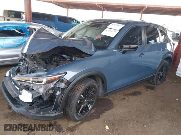 2022 Mazda CX-5 S Preferred z VIN JM3KFBCM7N0649343, wystawiony jako IAAI lot #42195377 z przebiegiem 32 313 mil mil oraz . Historia ofert i sprzedaży dostępna na DreamBid. Obrazek 18.