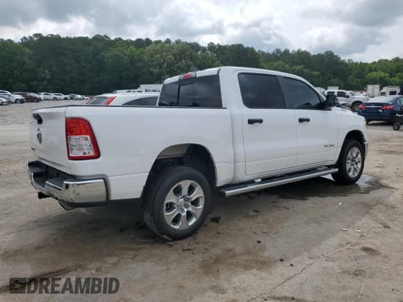 2023 Ram 1500 Big Horn with VIN 1C6RREFT6PN573744, listed as a Copart auction lot 58809175 with 35,469 mi miles and Salvage title. Bid and sale history available at DreamBid. Image 3.
