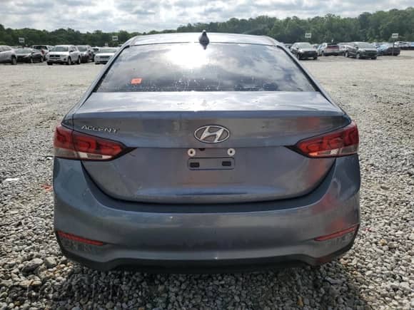 2018 Hyundai Accent Limited с VIN 3KPC34A38JE031087, выставлен на аукционе Copart как лот 56942635 с пробегом 129 692 миль миль и Списание • Salvage title. История ставок и продаж доступна на DreamBid. Изображение 6.