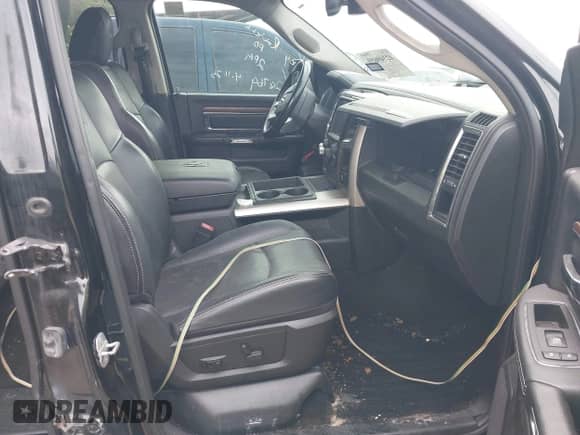 2014 Ram 1500 Laramie z VIN 1C6RR7NM7ES353887, wystawiony jako IAAI lot #42349659 z przebiegiem 206 055 mil mil oraz . Historia ofert i sprzedaży dostępna na DreamBid. Obrazek 5.