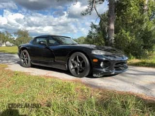 2000 Dodge Viper RT/10 with VIN 1B3ER65E9YV604682, listed as a Copart auction lot 87103775 with 56,029 mi miles and Clean title. Bid and sale history available at DreamBid. Image 1.