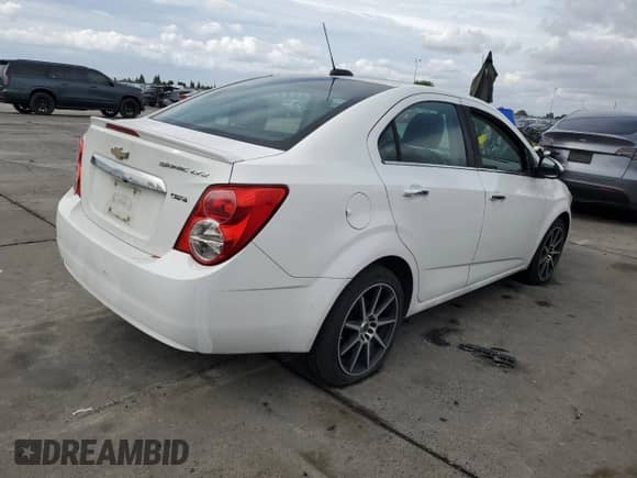 2016 Chevrolet Sonic LTZ with VIN 1G1JE5SB9G4153716, listed as a Copart auction lot 82182935 with Not provided miles and Salvage title. Bid and sale history available at DreamBid. Image 3.