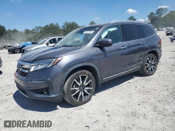 2019 Honda Pilot Touring 8-Passenger with VIN 5FNYF6H99KB033154, listed as a Copart auction lot 70672085 with 104,300 mi miles and Salvage title. Bid and sale history available at DreamBid. Image 1.