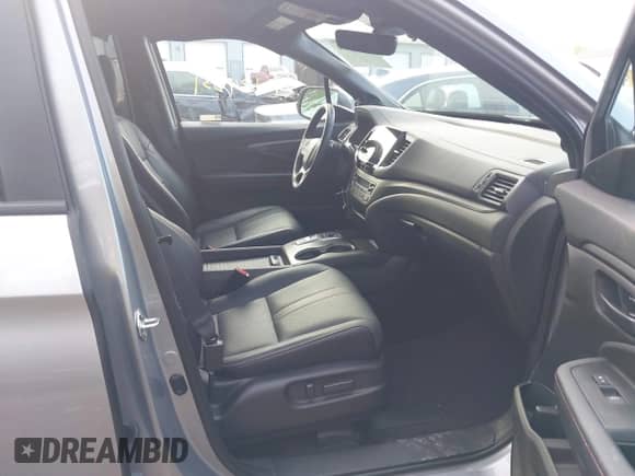 2023 Honda Passport TrailSport с VIN 5FNYF8H6XPB044222, выставлен на аукционе IAAI как лот 42134331 с пробегом 19 026 миль миль и . История ставок и продаж доступна на DreamBid. Изображение 5.