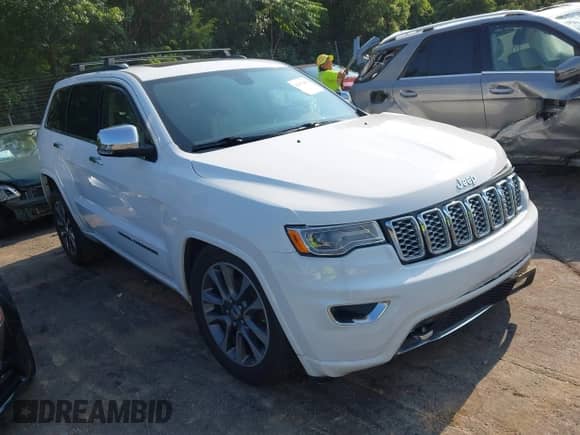 2017 Jeep Grand Cherokee Overland with VIN 1C4RJFCG1HC633004, listed as a IAAI auction lot 42672905 with 138,018 mi miles and . Bid and sale history available at DreamBid. Image 1.