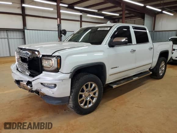 2016 GMC Sierra 1500 Denali z VIN 3GTU2PEJ1GG221537, wystawiony jako Copart lot #80850875 z przebiegiem Nie podano mil oraz Szkoda całkowita • Salvage title. Historia ofert i sprzedaży dostępna na DreamBid. Obrazek 1.