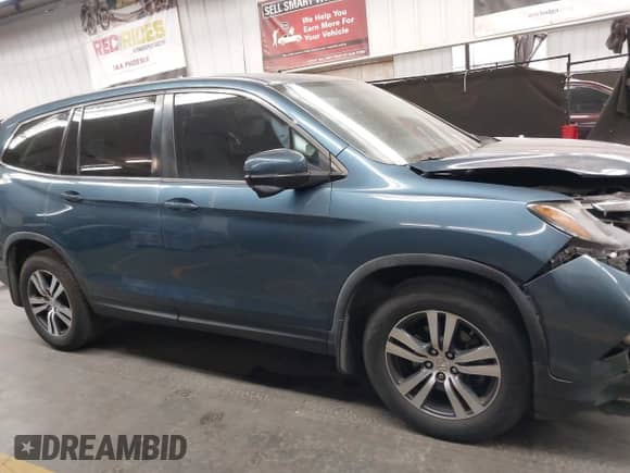 2018 Honda Pilot EX-L z VIN 5FNYF5H5XJB018331, wystawiony jako IAAI lot #43398582 z przebiegiem 184 069 mil mil oraz . Historia ofert i sprzedaży dostępna na DreamBid. Obrazek 13.