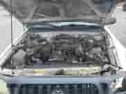 2004 Toyota Tacoma with VIN 5TENL42NX4Z405981, listed as a Copart auction lot 84646305 with 292,950 mi miles and Salvage title. Bid and sale history available at DreamBid. Image 11.