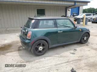 2007 MINI Hardtop with VIN WMWMF33537TL77985, listed as a Copart auction lot 61908635 with 180,470 mi miles and Salvage title. Bid and sale history available at DreamBid. Image 3.