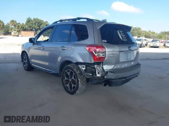 2016 Subaru Forester XT Touring with VIN JF2SJGXC1GH405232, listed as a IAAI auction lot 43370477 with 201,225 mi miles and . Bid and sale history available at DreamBid. Image 3.