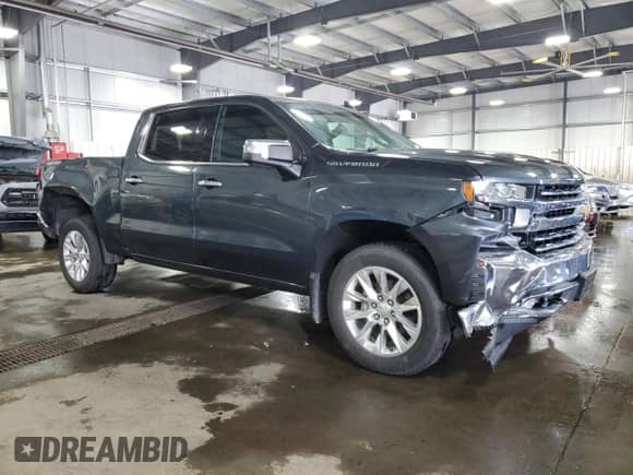 2021 Chevrolet Silverado 1500 LTZ with VIN 1GCUYGEL3MZ124528, listed as a Copart auction lot 71037135 with 123,387 mi miles and Salvage title. Bid and sale history available at DreamBid. Image 4.