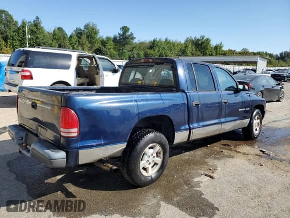 2002 Dodge Dakota Sport с VIN 1B7HL38X42S589588, выставлен на аукционе Copart как лот 75025304 с пробегом 262 560 миль миль и Списание • Salvage title. История ставок и продаж доступна на DreamBid. Изображение 3.