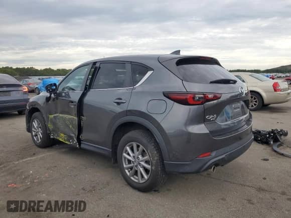 2023 Mazda CX-5 S Carbon Edition z VIN JM3KFBCMXP0132444, wystawiony jako Copart lot #71873865 z przebiegiem 22 248 mil mil oraz Szkoda całkowita • Salvage title. Historia ofert i sprzedaży dostępna na DreamBid. Obrazek 2.