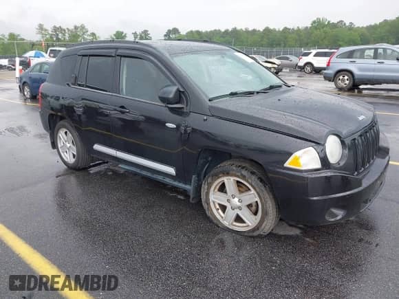 2010 Jeep Compass Sport z VIN 1J4NT1FB6AD638222, wystawiony jako IAAI lot #42076051 z przebiegiem 201 986 mil mil oraz . Historia ofert i sprzedaży dostępna na DreamBid. Obrazek 1.