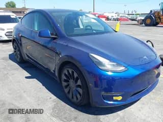 2021 Tesla Model Y Performance with VIN 5YJYGDEFXMF140888, listed as a IAAI auction lot 43027529 with 52,891 mi miles and . Bid and sale history available at DreamBid. Image 1.
