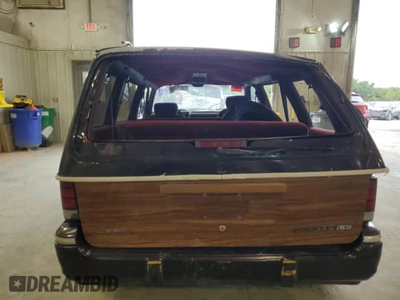 1991 Dodge Caravan с VIN 2B4GK55R0MR223855, выставлен на аукционе Copart как лот 72819484 с пробегом Не указан миль и Списание • Salvage title. История ставок и продаж доступна на DreamBid. Изображение 6.