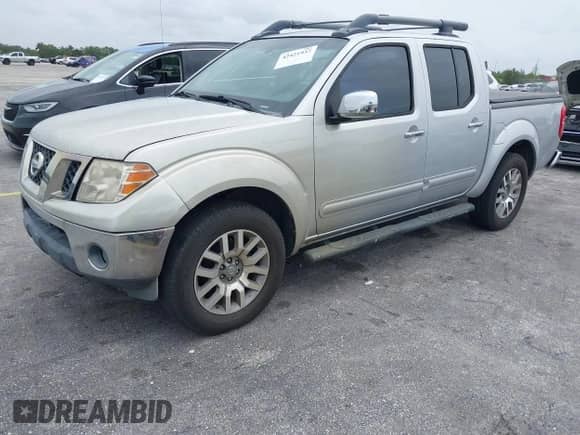 2010 Nissan Frontier SE with VIN 1N6AD0ER7AC404863, listed as a IAAI auction lot 42421937 with 200,669 mi miles and . Bid and sale history available at DreamBid. Image 18.