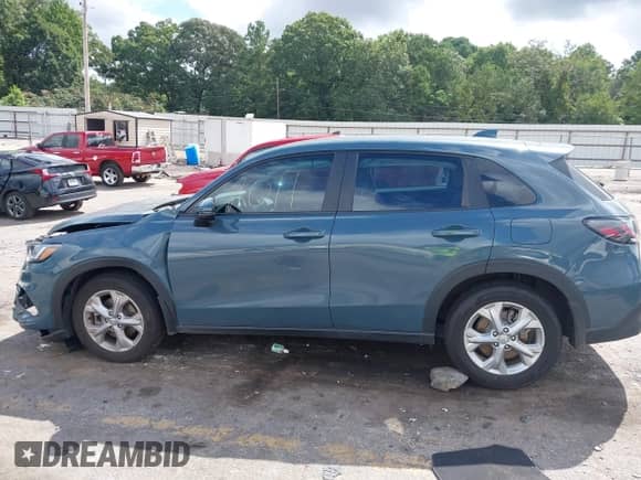2025 Honda HR-V LX with VIN 3CZRZ1H36SM711648, listed as a IAAI auction lot 42970785 with 19,437 mi miles and . Bid and sale history available at DreamBid. Image 14.