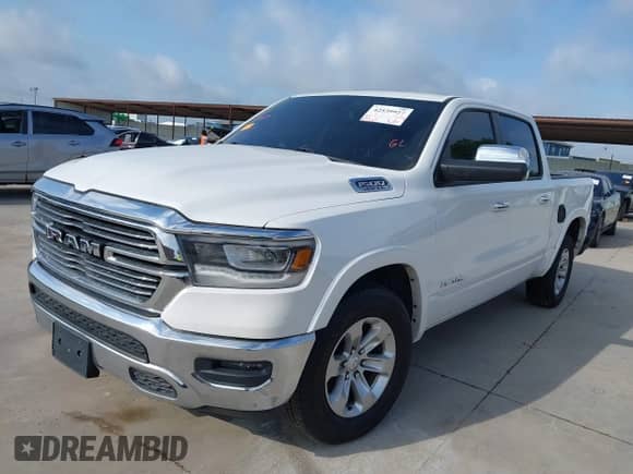 2019 Ram 1500 Laramie z VIN 1C6RREJTXKN743443, wystawiony jako IAAI lot #42539927 z przebiegiem 95 220 mil mil oraz . Historia ofert i sprzedaży dostępna na DreamBid. Obrazek 21.