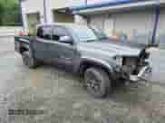 2022 Toyota Tacoma SR5 with VIN 3TMAZ5CN6NM169121, listed as a Copart auction lot 58412475 with 83,911 mi miles and Salvage title. Bid and sale history available at DreamBid. Image 4.