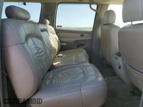 2001 Chevrolet Suburban LS z VIN 3GNEC16T81G219443, wystawiony jako Copart lot #77371104 z przebiegiem 162 801 mil mil oraz Czysty tytuł • Clean title. Historia ofert i sprzedaży dostępna na DreamBid. Obrazek 11.