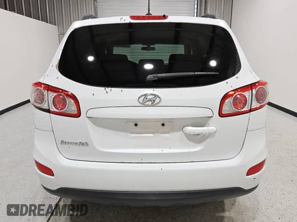 2012 Hyundai Santa Fe GLS с VIN 5XYZG4AG0CG124239, выставлен на аукционе Copart как лот 87046285 с пробегом 151 301 миль миль и Чистый • Clean title. История ставок и продаж доступна на DreamBid. Изображение 6.